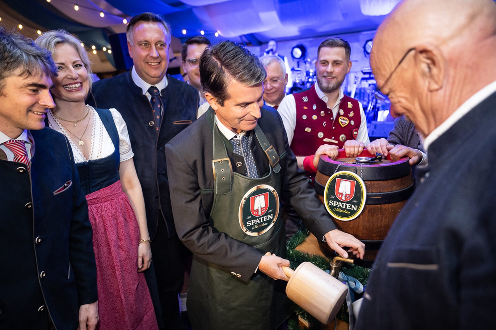 Tapping a Spaten keg in the tent