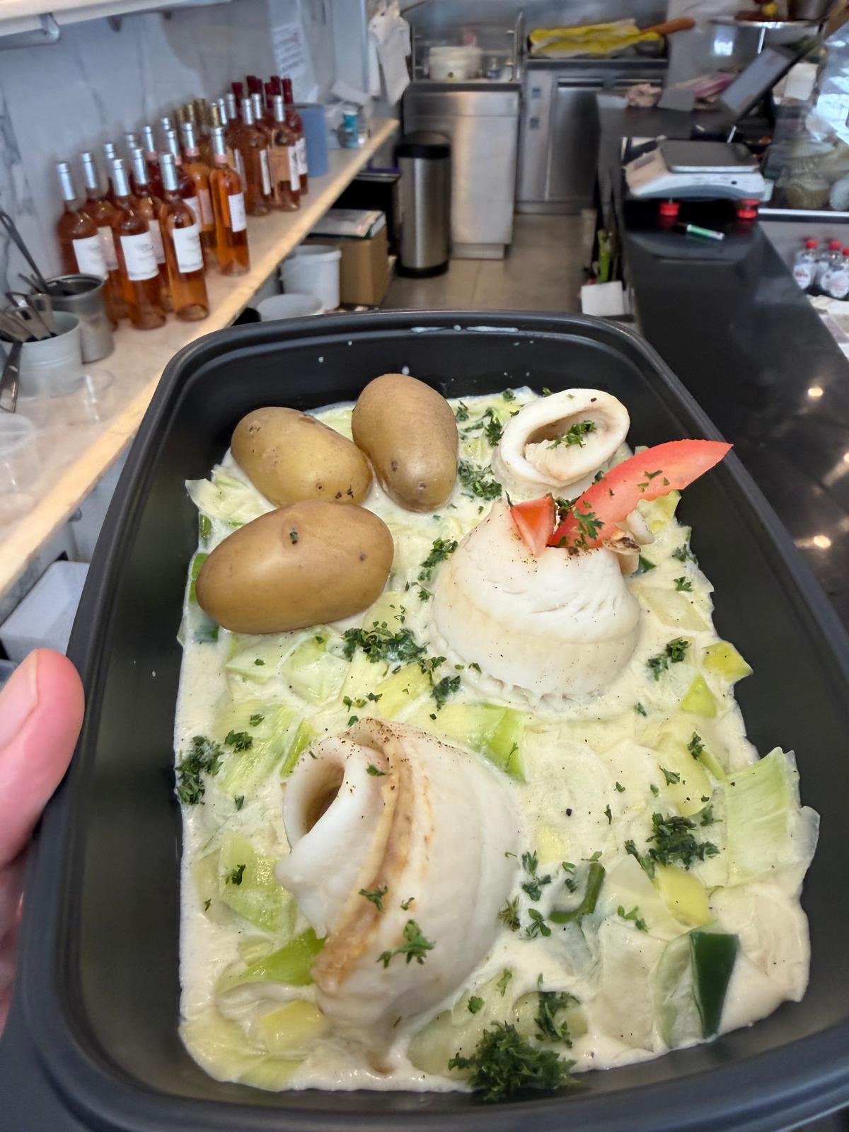 Squid in leek cream with plain potatoes