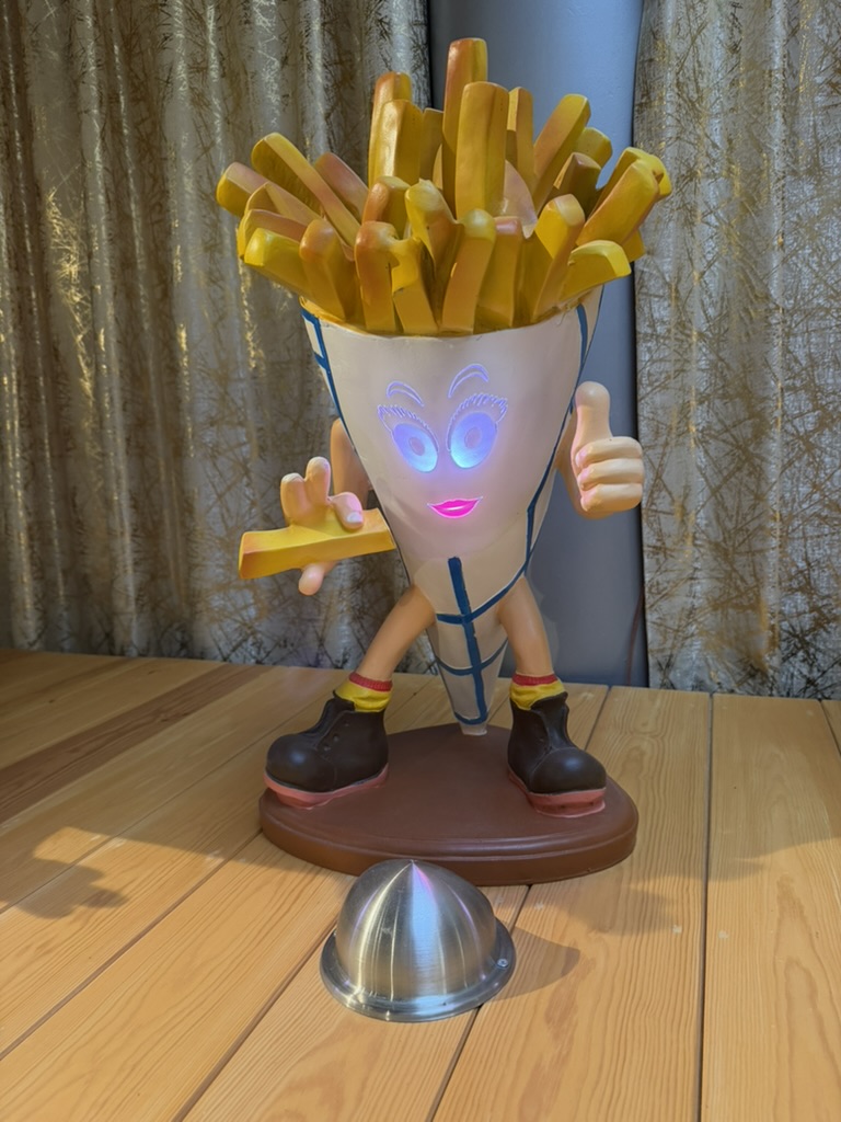 Smiling cone-of-fries figurine at the Friet Museum Brussels
