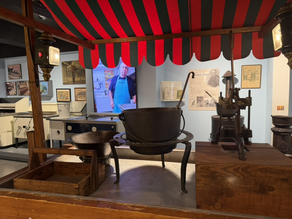 Reconstructed historic Belgian fry stall with red and green striped awning