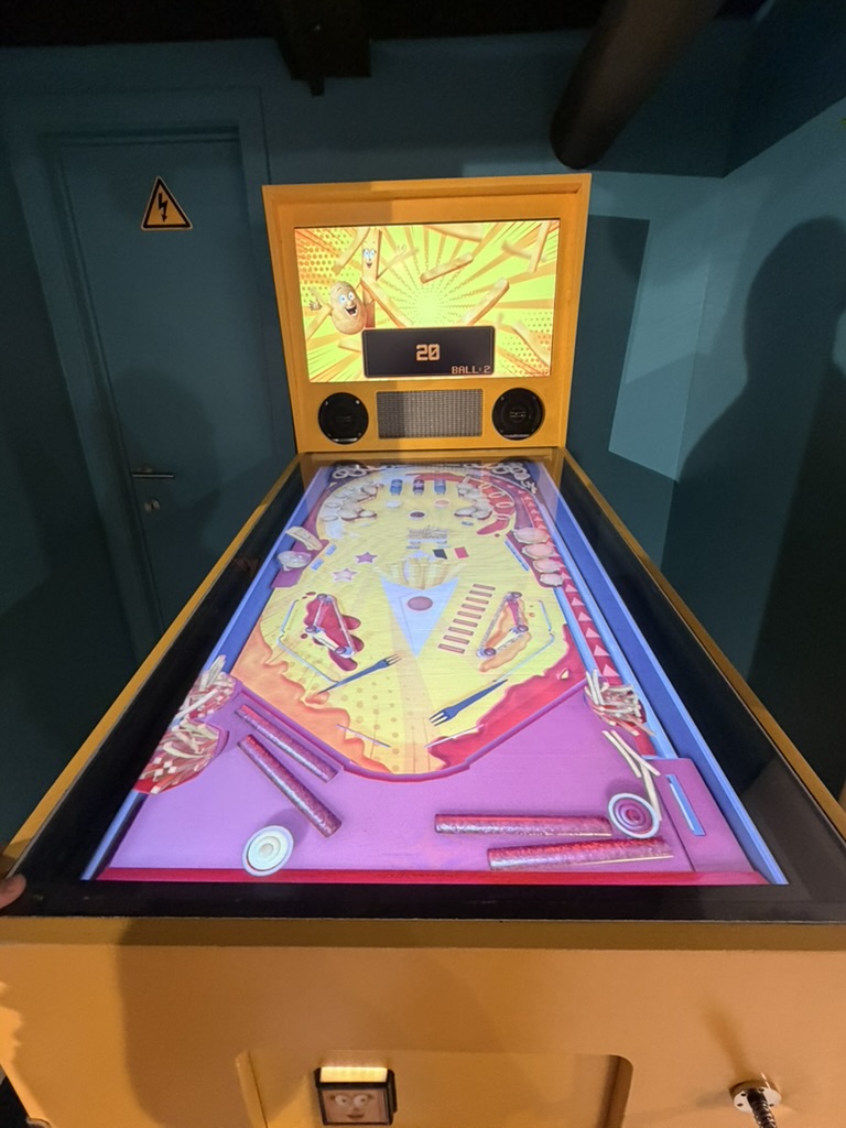 Colourful pinball machine on the potato and fries theme at the Friet Museum